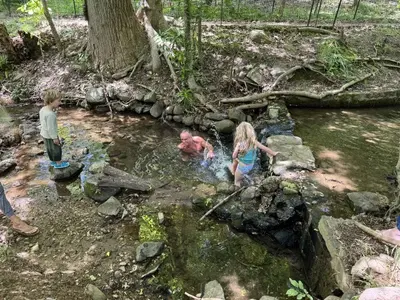 kennedy-swimming-rock-creek.webp