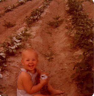 Travis in garden with soda.jpg
