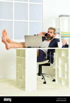 aming-at-home-remote-workday-with-computer-2C7J2AG.jpg
